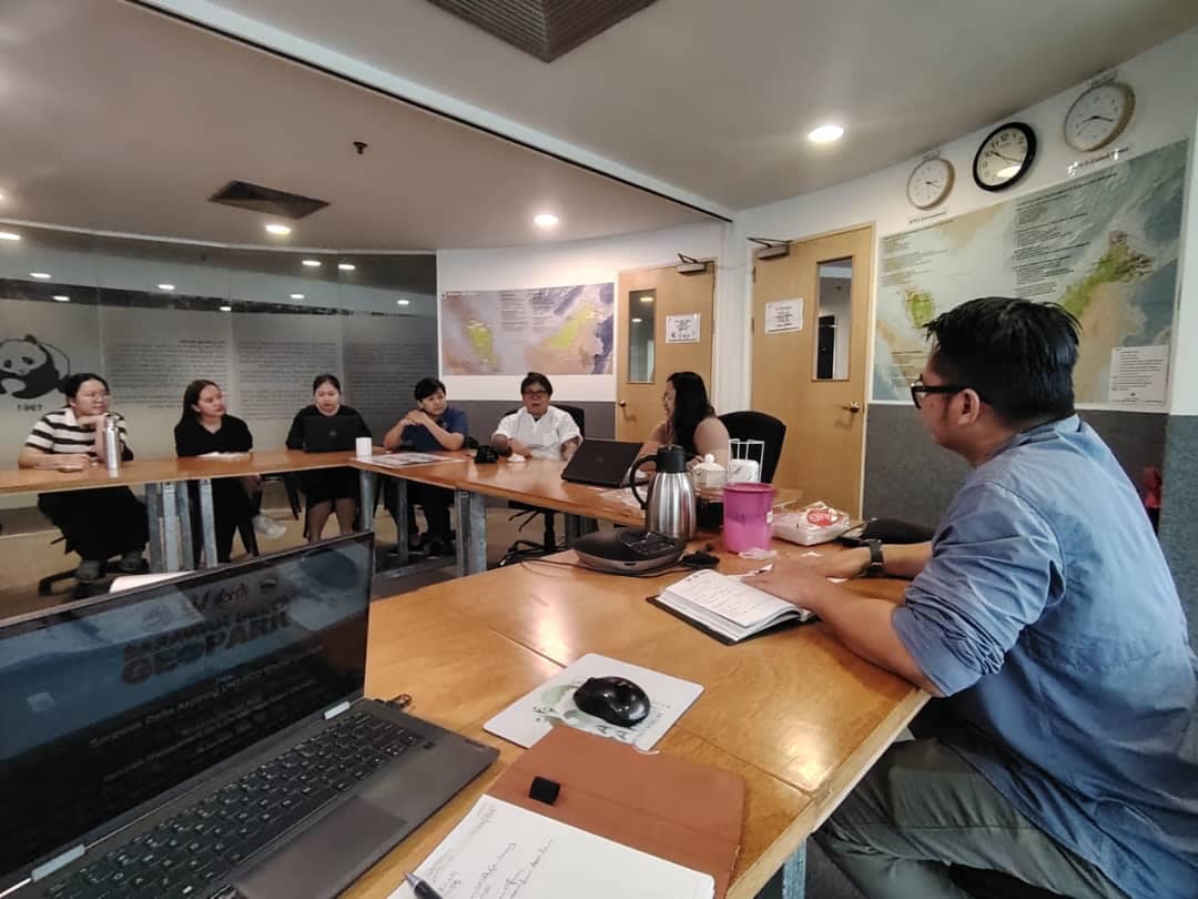 May be an image of 7 people, people studying and text